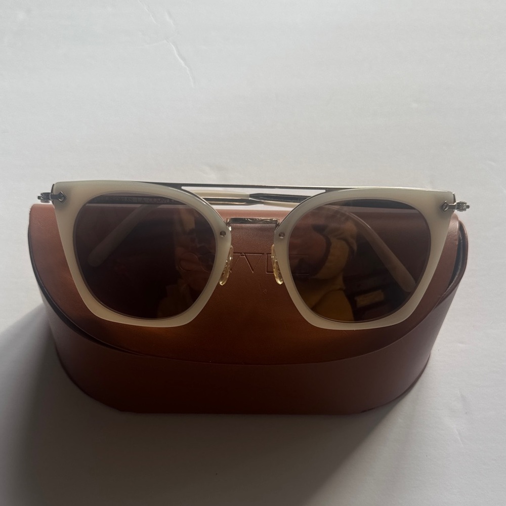 Oliver Peoples Cream Frame Sunglasses with Gold Bridge and Brown Lenses